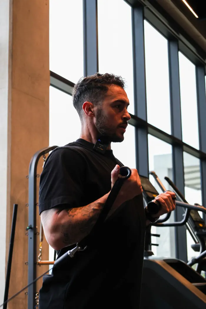 Eric coaching on the cable machine